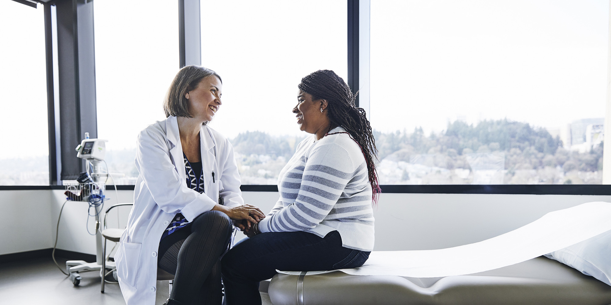 Doctor and patient smiling
